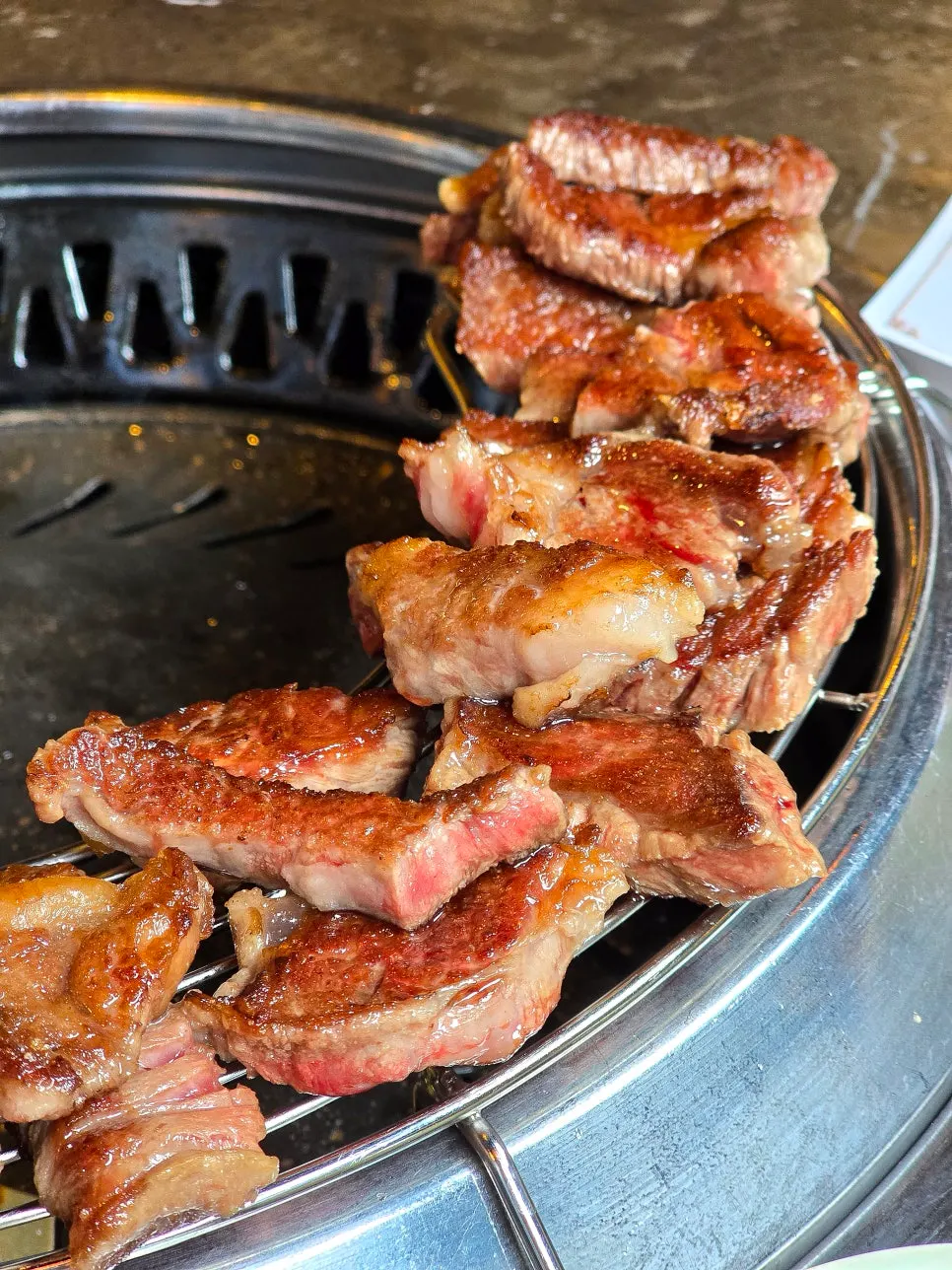 Grilled premium sirloin pieces glistening with juices