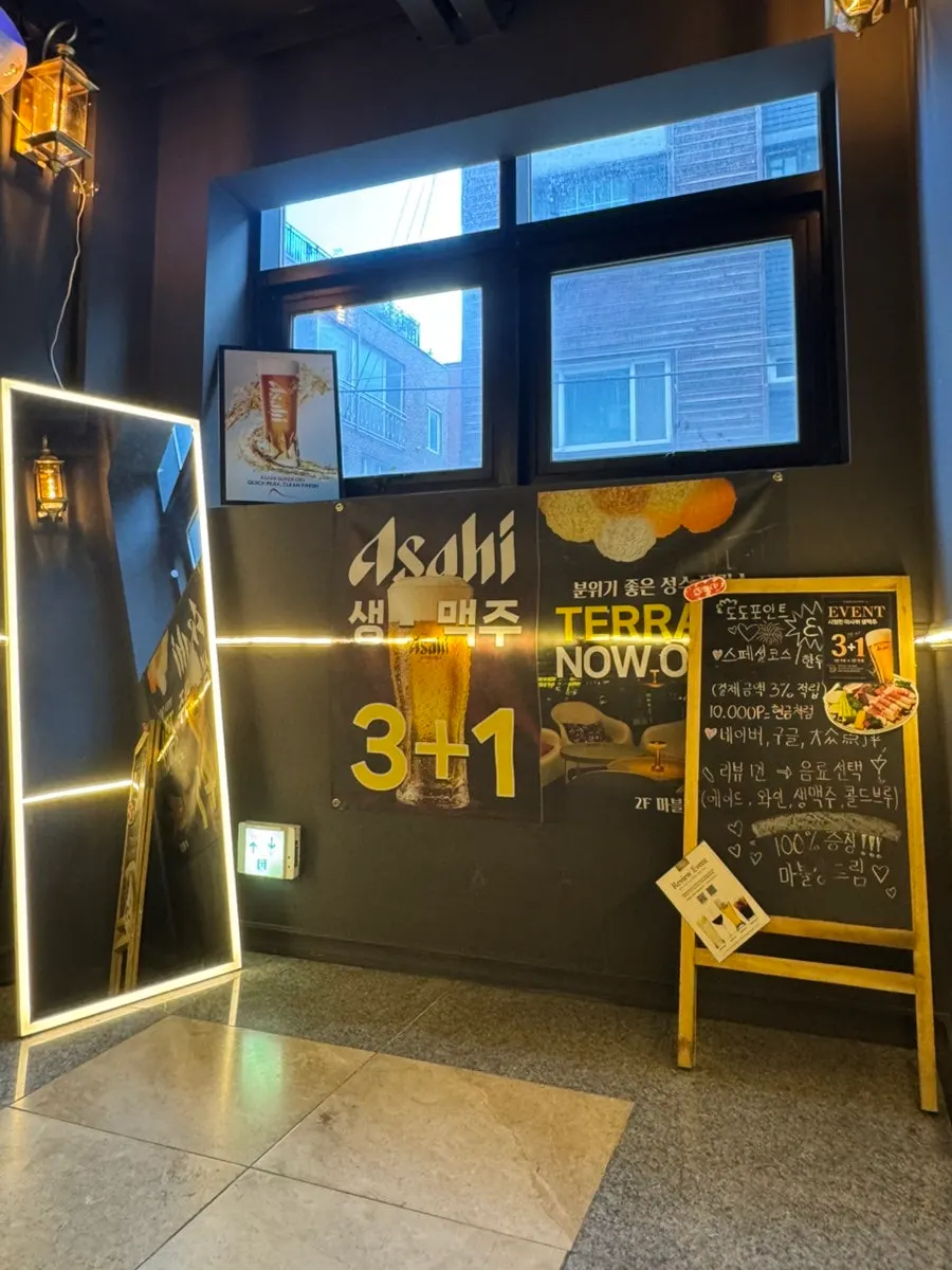 Staircase and lighting leading up to Marblejeong's 2nd floor