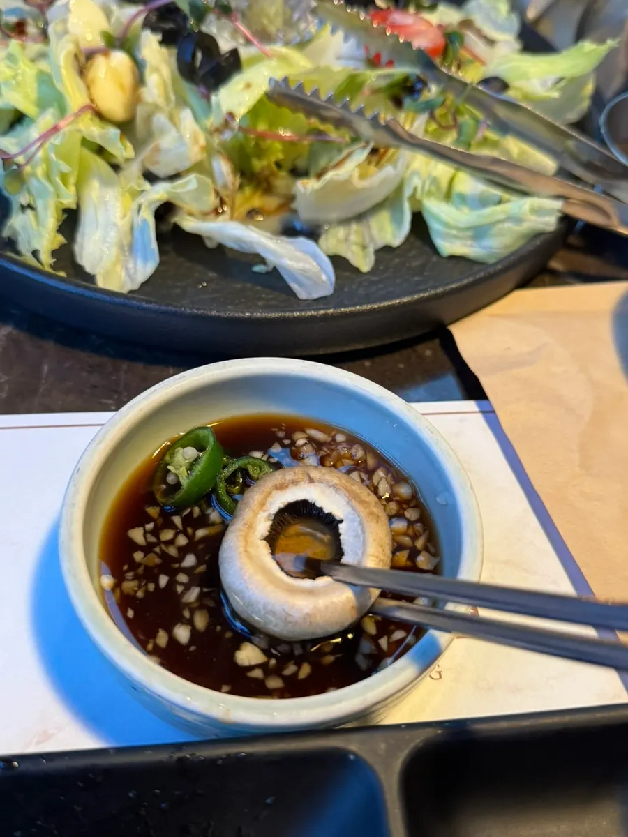 Hanwoo paired with vegetable wrap and meat sauce