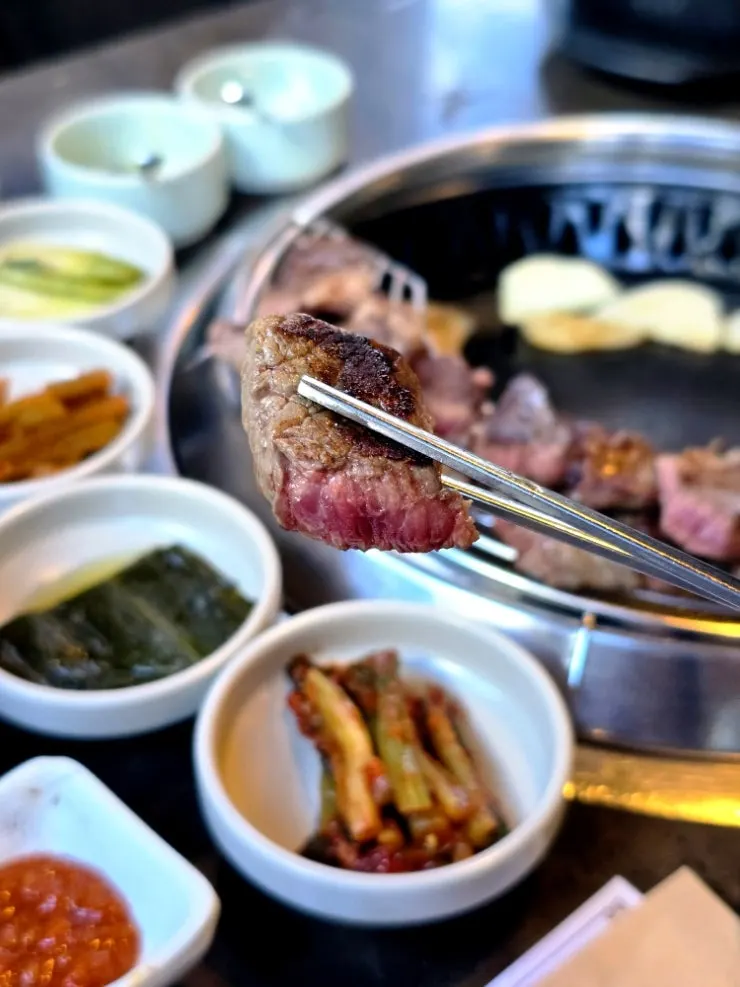 Korean beef being grilled at the table