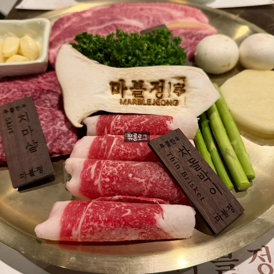 Raw 1++ grade Korean beef with clear marbling