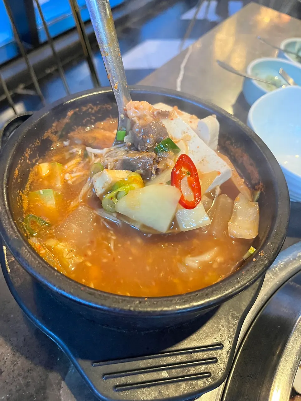 Doenjang stew served with a bowl of rice