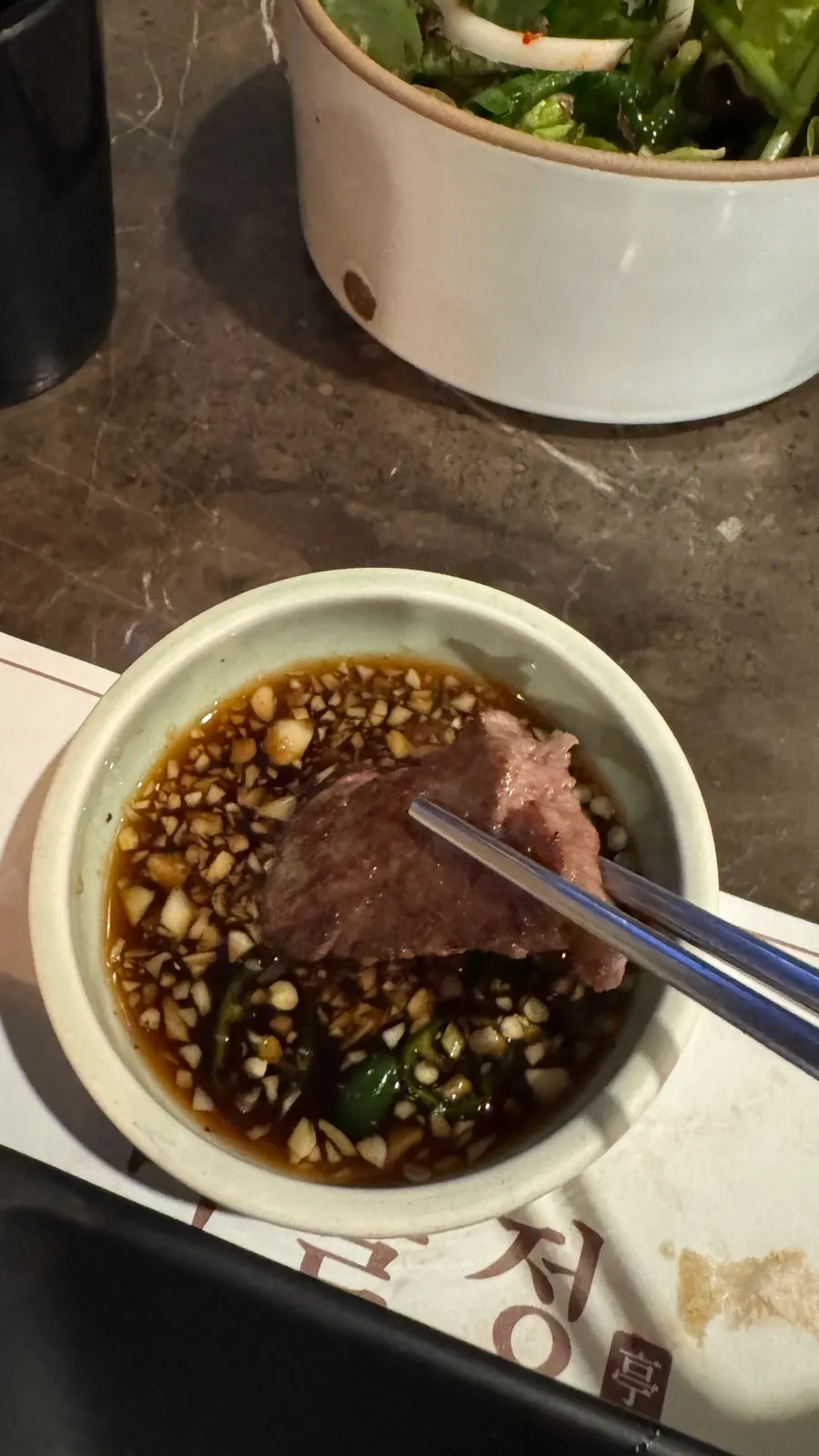Korean beef sirloin served with salt and the special sauce