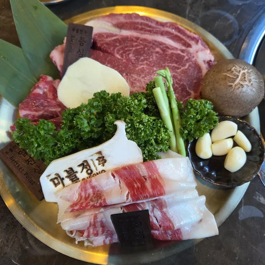 The 1++ Korean beef mixed grill served on a plate
