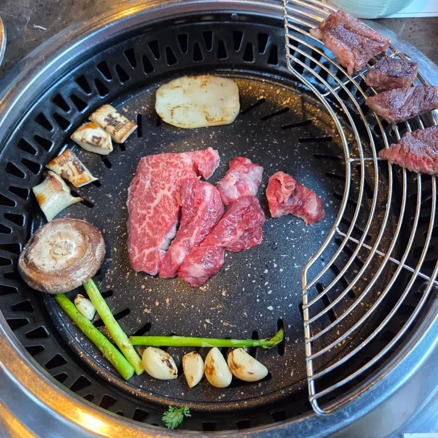 Brisket point on the grill with mushrooms and asparagus