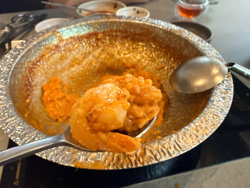 A bowl of rosé risotto served on a plate