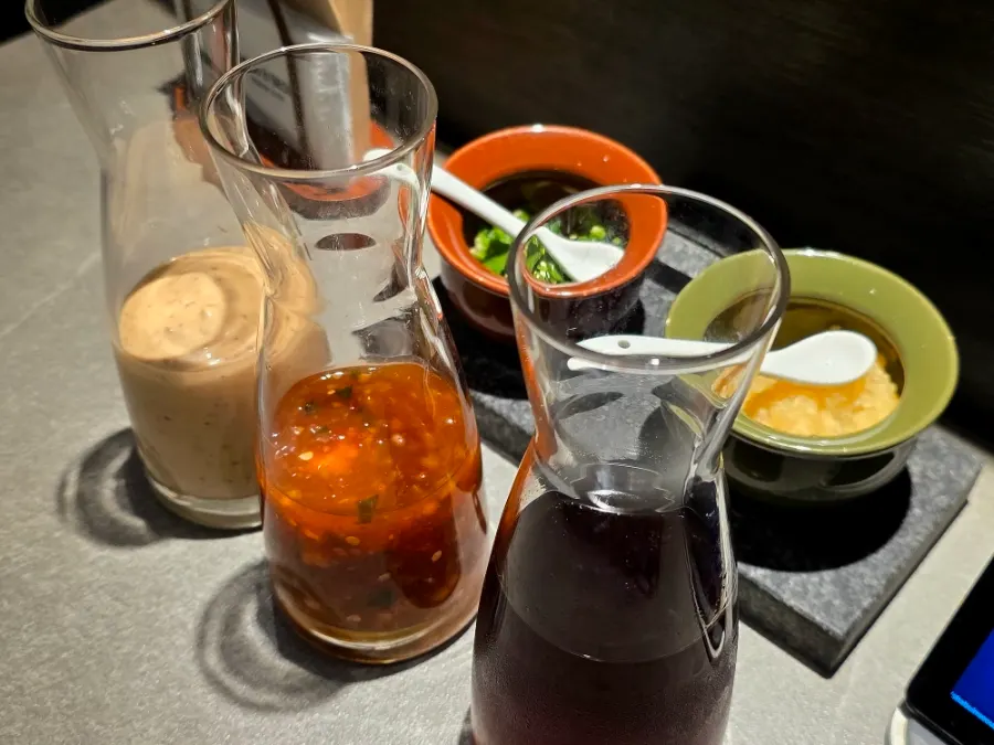 Shabu-shabu sauces on the table