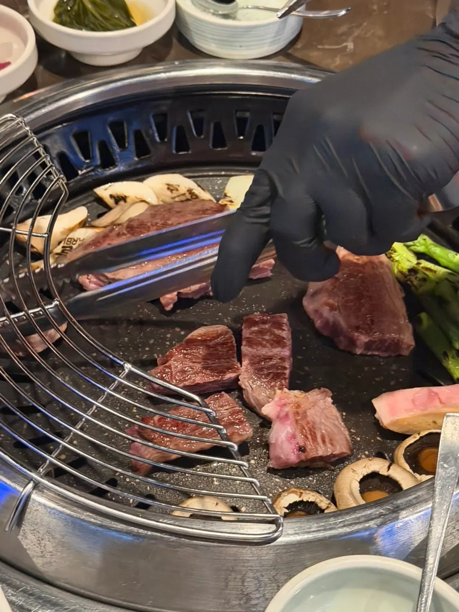 Staff grilling the hanwoo sirloin