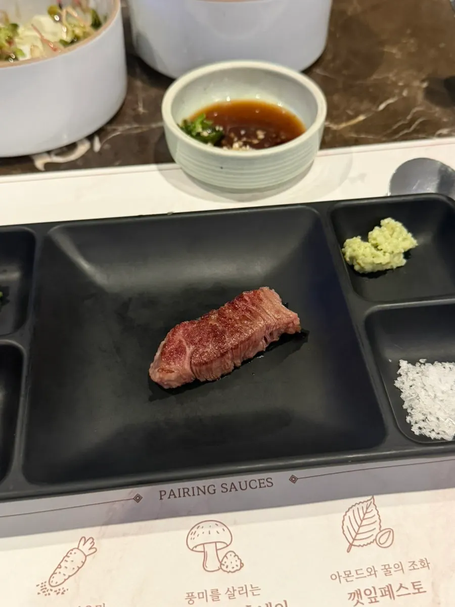 A piece of hanwoo sirloin dipped in salt