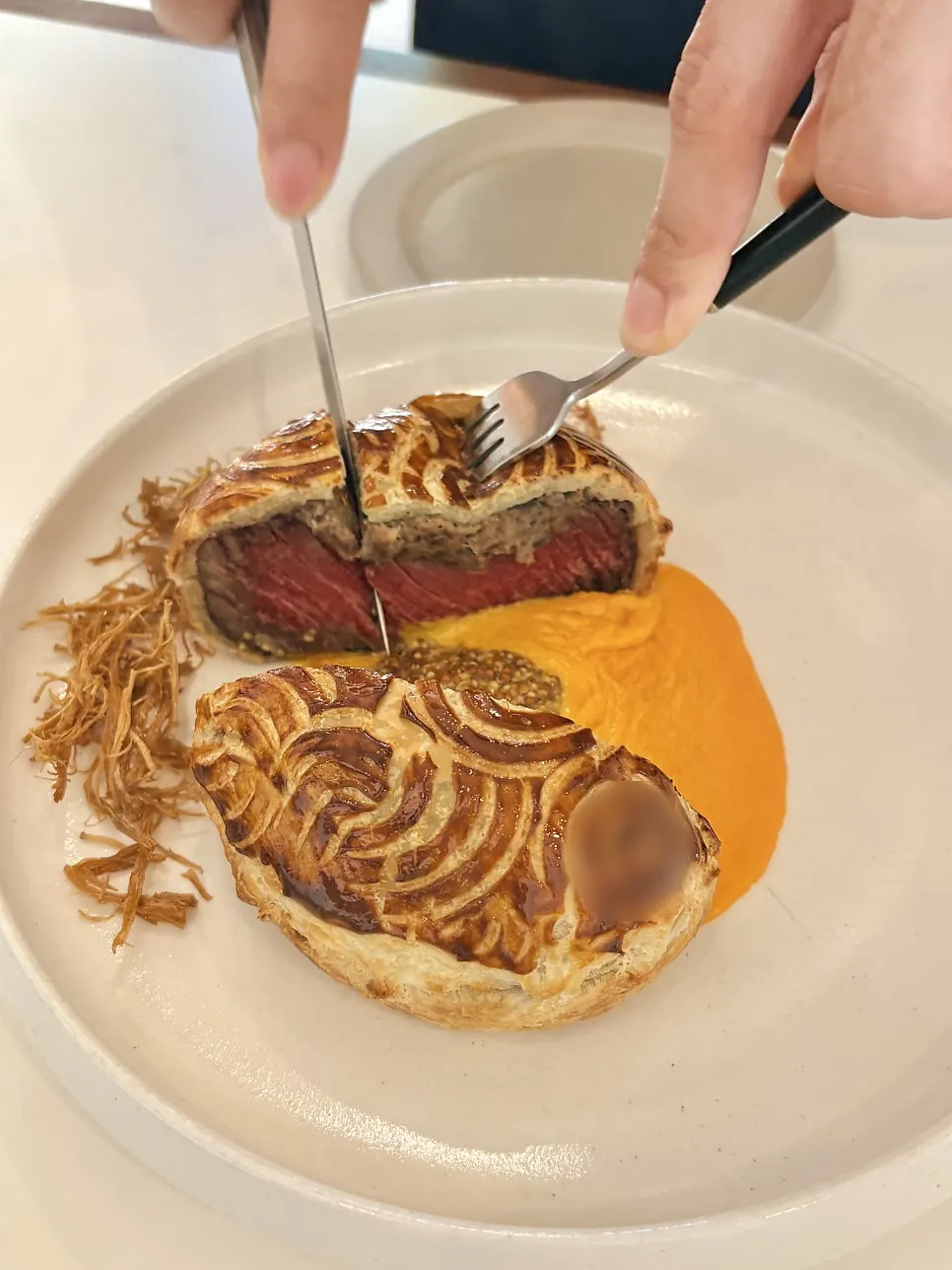 Cross-section of the medium-rare sliced tenderloin