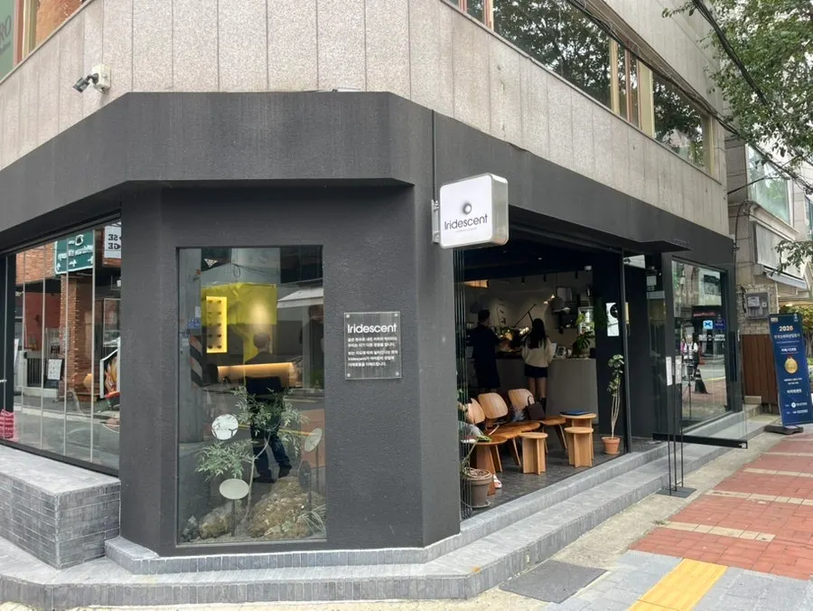 Exterior of Iridescent café in Seongsu with the open floor-to-ceiling window