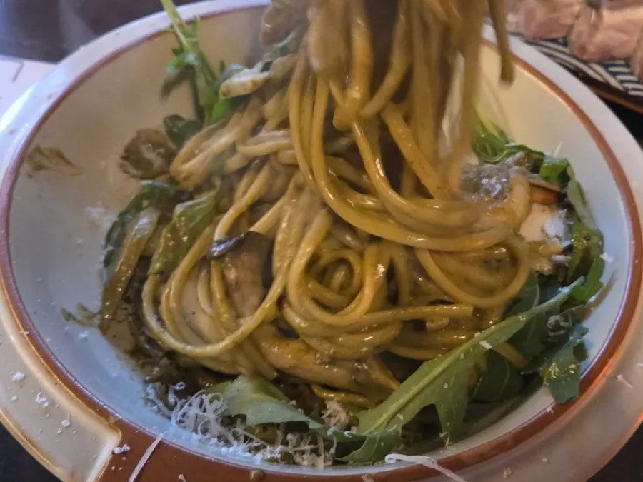 Abalone innards pasta topped with a whole abalone
