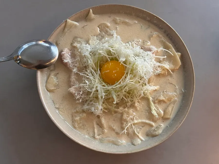 A plate of doenjang carbonara sujebi