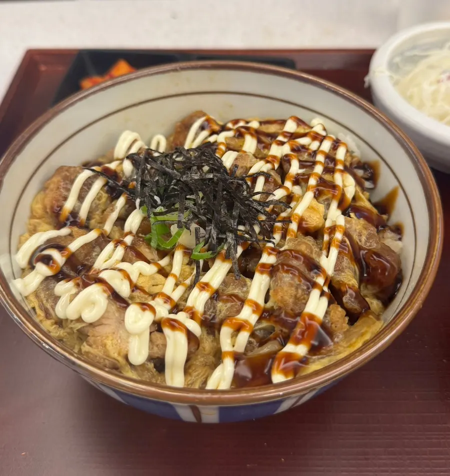 Dipping soba noodles into the tsuyu sauce