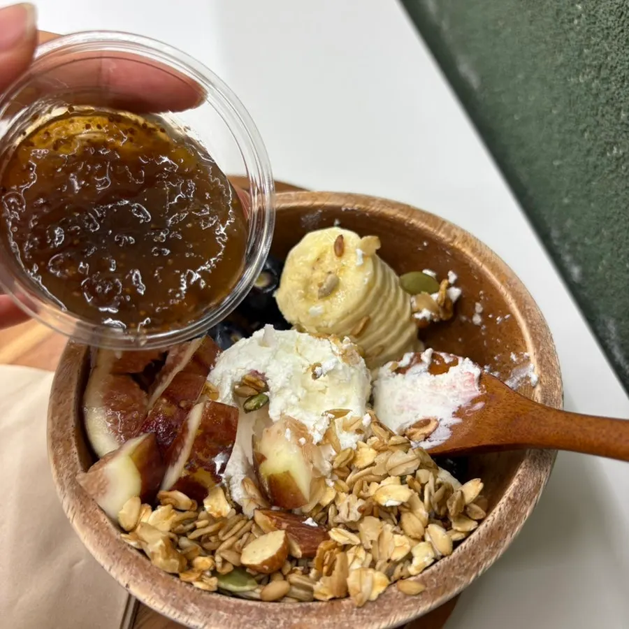 Greek yogurt topped with figs and granola