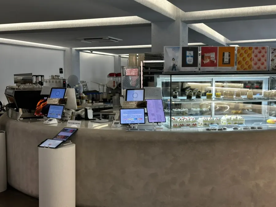 White-toned interior of LOOOP Bakery café