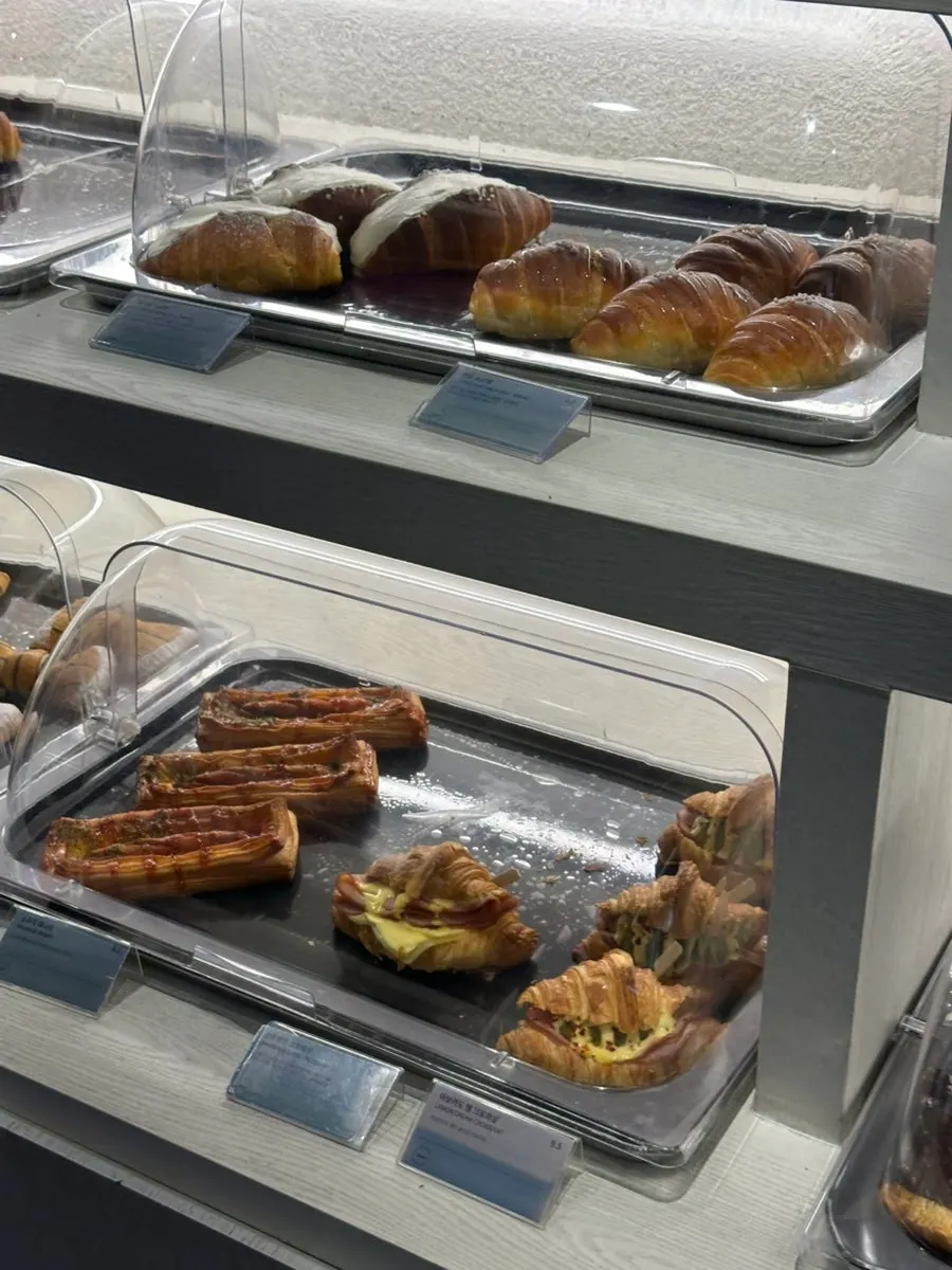 Display of levain cookies and baked pastries