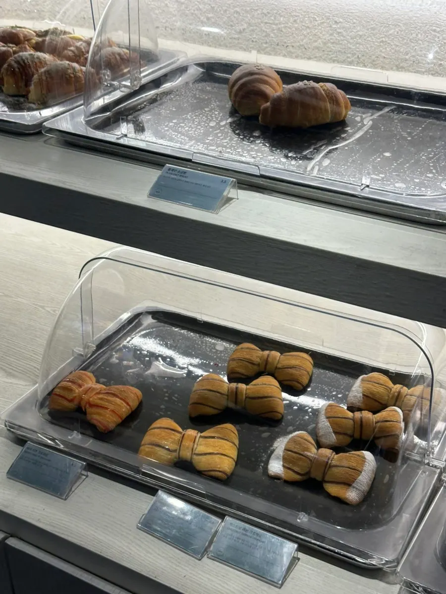 Dessert case with egg tarts and muffins