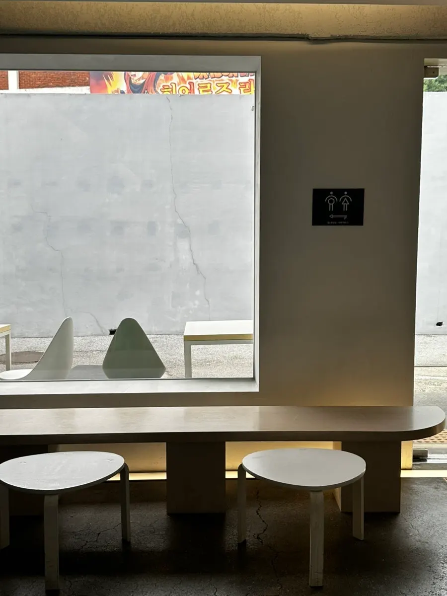 Window-side table with a large window