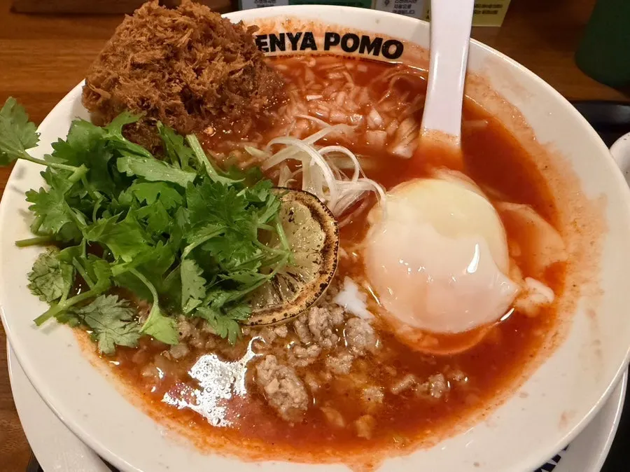 A hearty portion of tom yum beef cutlet ramen