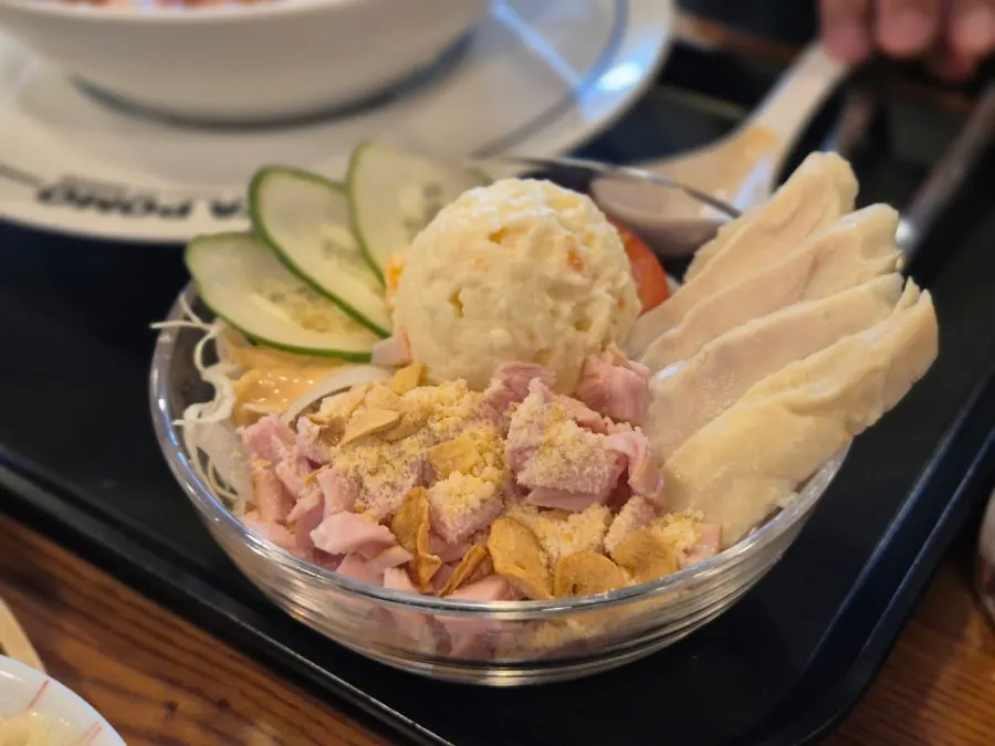 Cabbage salad served with the katsu