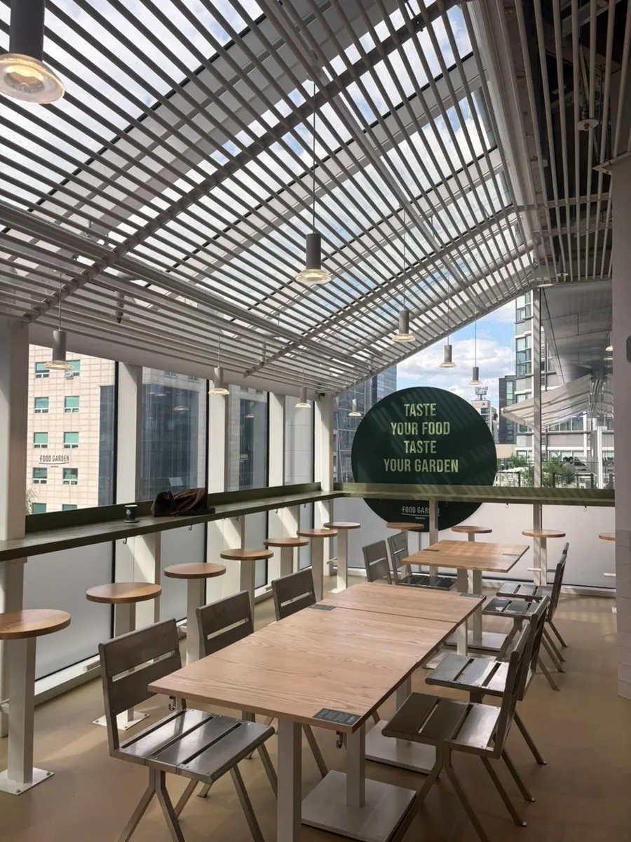 Interior of the store with tables and bar seats