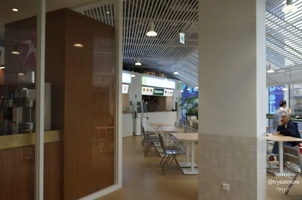Dwaeji Gomtang House special pop-up store seen through the automatic door