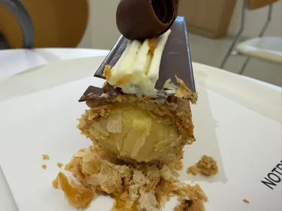 Plate with a cut piece of Salted Caramel Mille-feuille