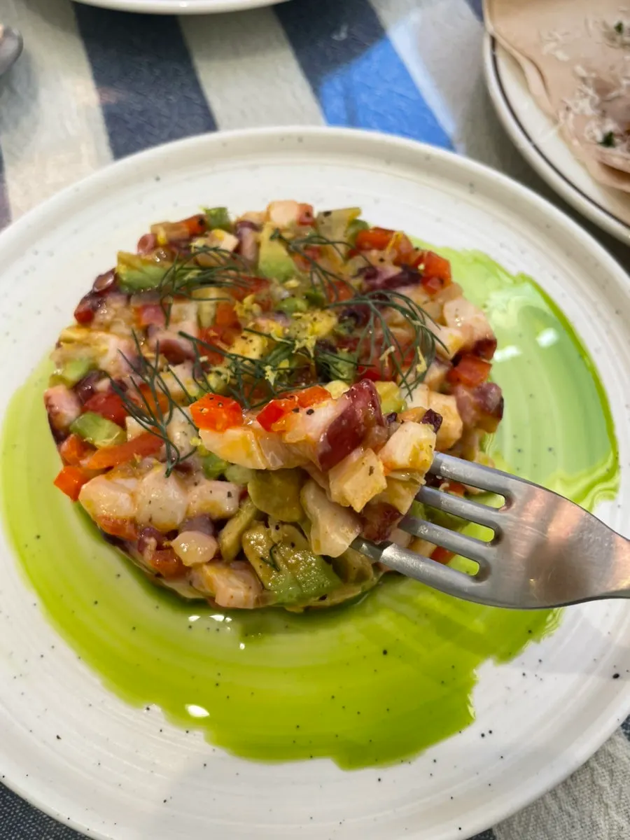 Carpaccio with octopus, avocado, and vegetables