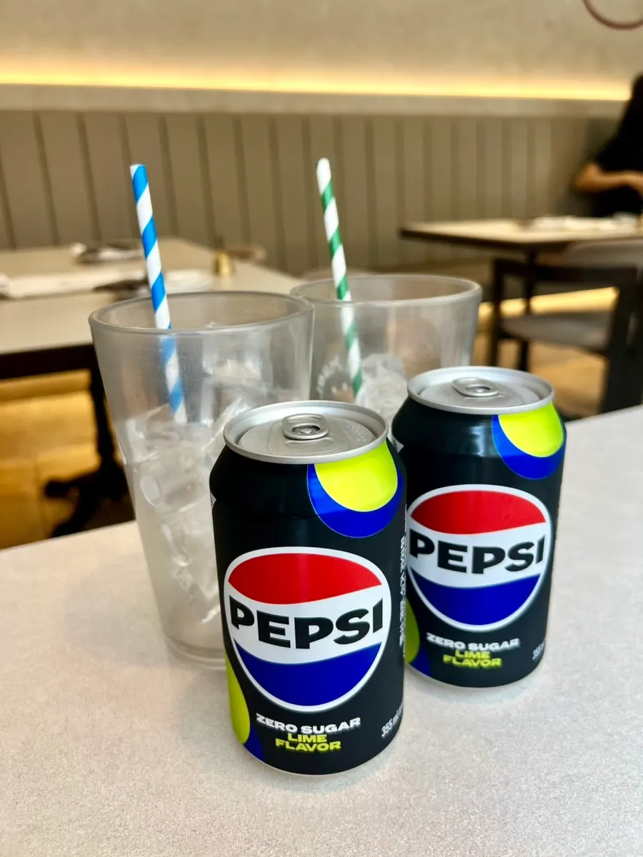 Two glasses of Pepsi Zero served first