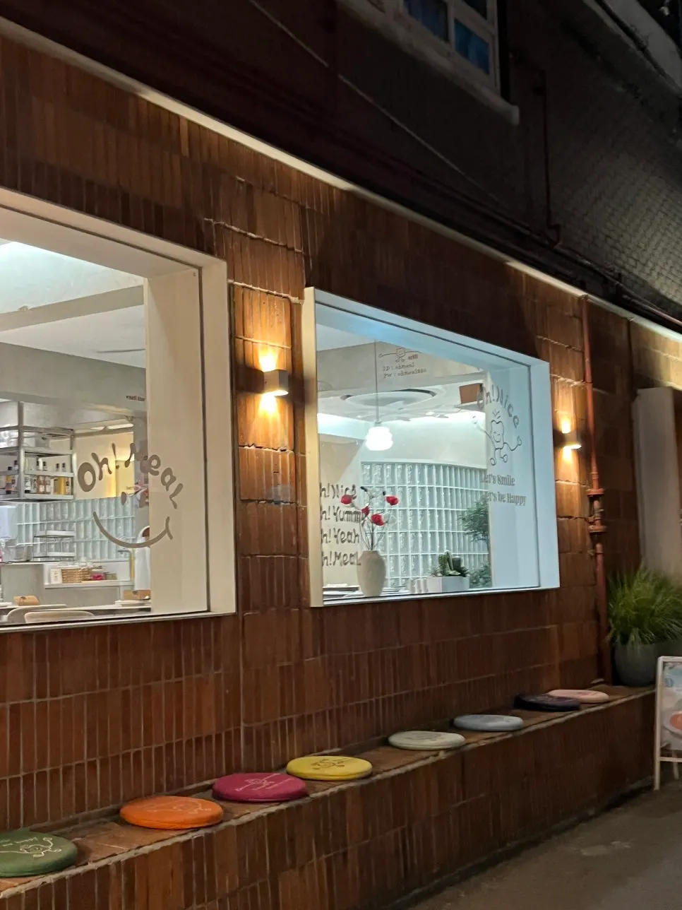 Window-side exterior of Omil Seongsu with outdoor cushions