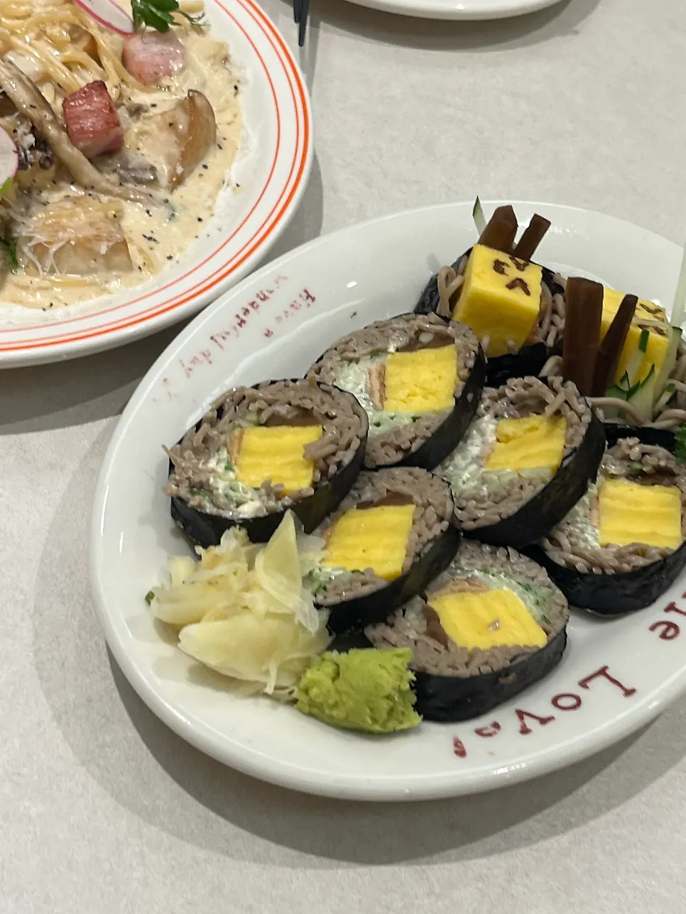 Soba maki roll served with wasabi and pickled ginger
