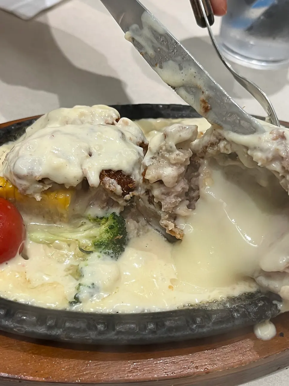 Omil steak topped with cream sauce