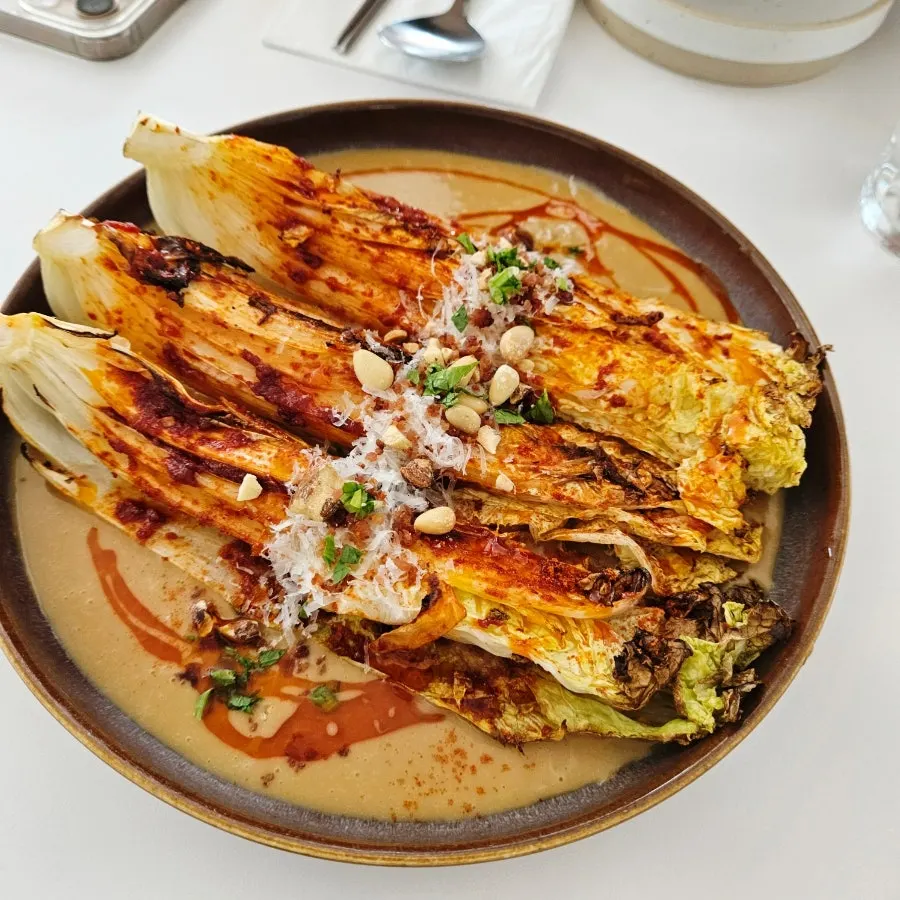 A plate of grilled napa cabbage at Out of Order Seongsu