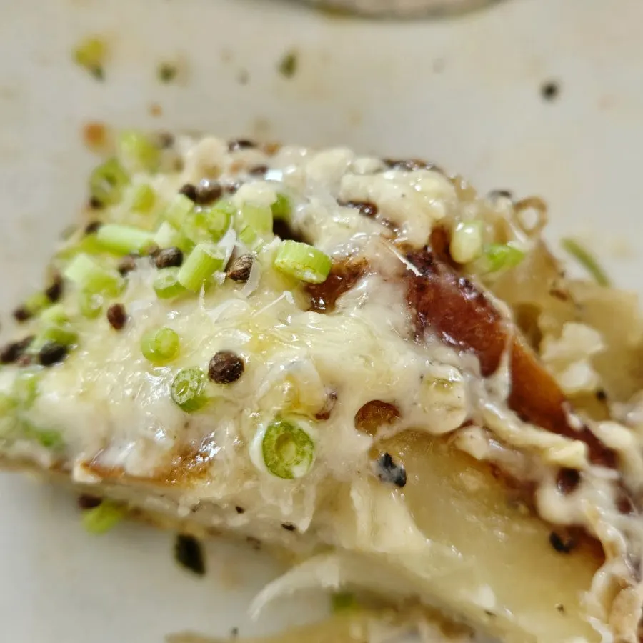 Cross-section of the potato pavé cut with a fork