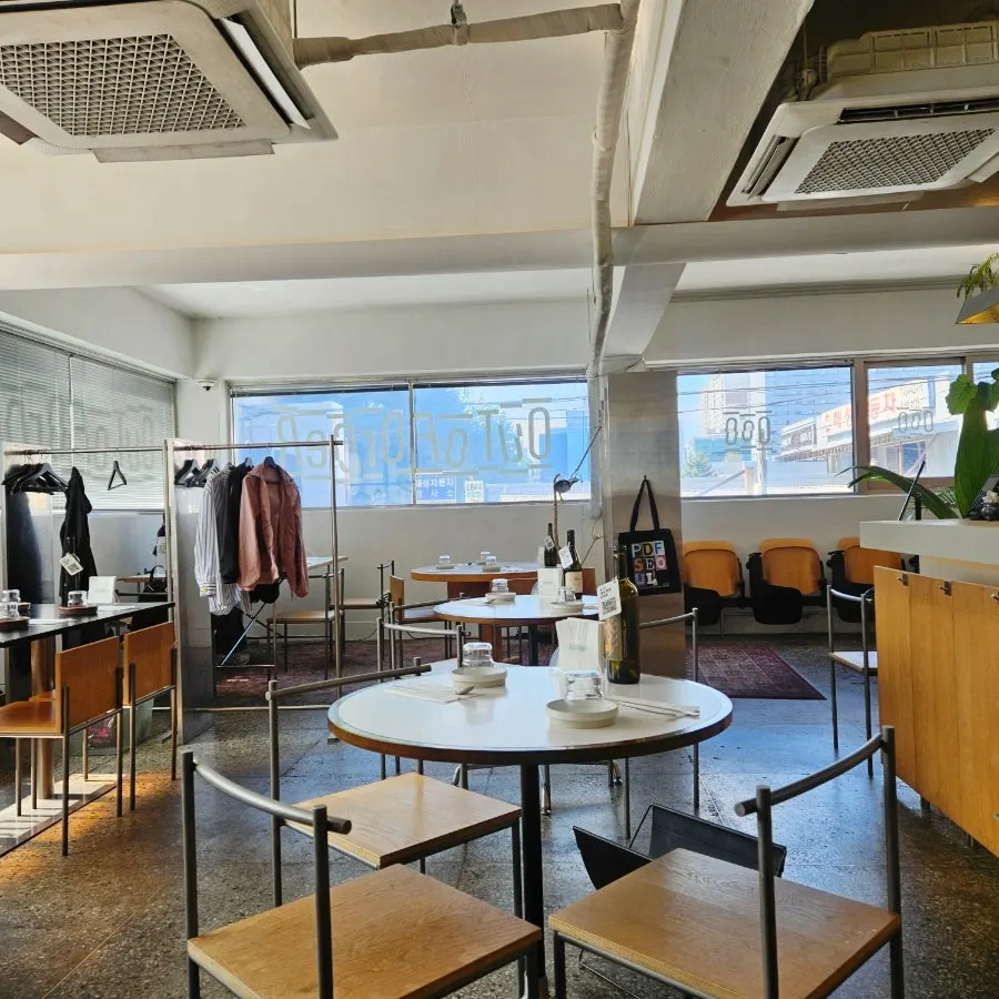 Sunlit seating by the window at Out of Order Seongsu