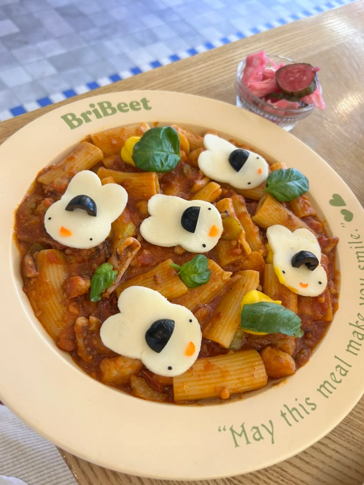 Tomato pasta topped with a mozzarella rabbit decoration
