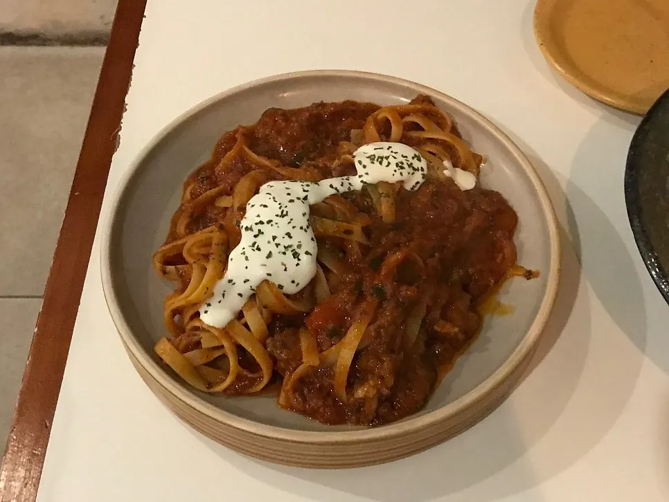 A plate of spicy tomato ragu fettuccine