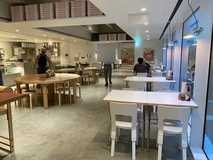 Spacious interior with American pizzeria vibe