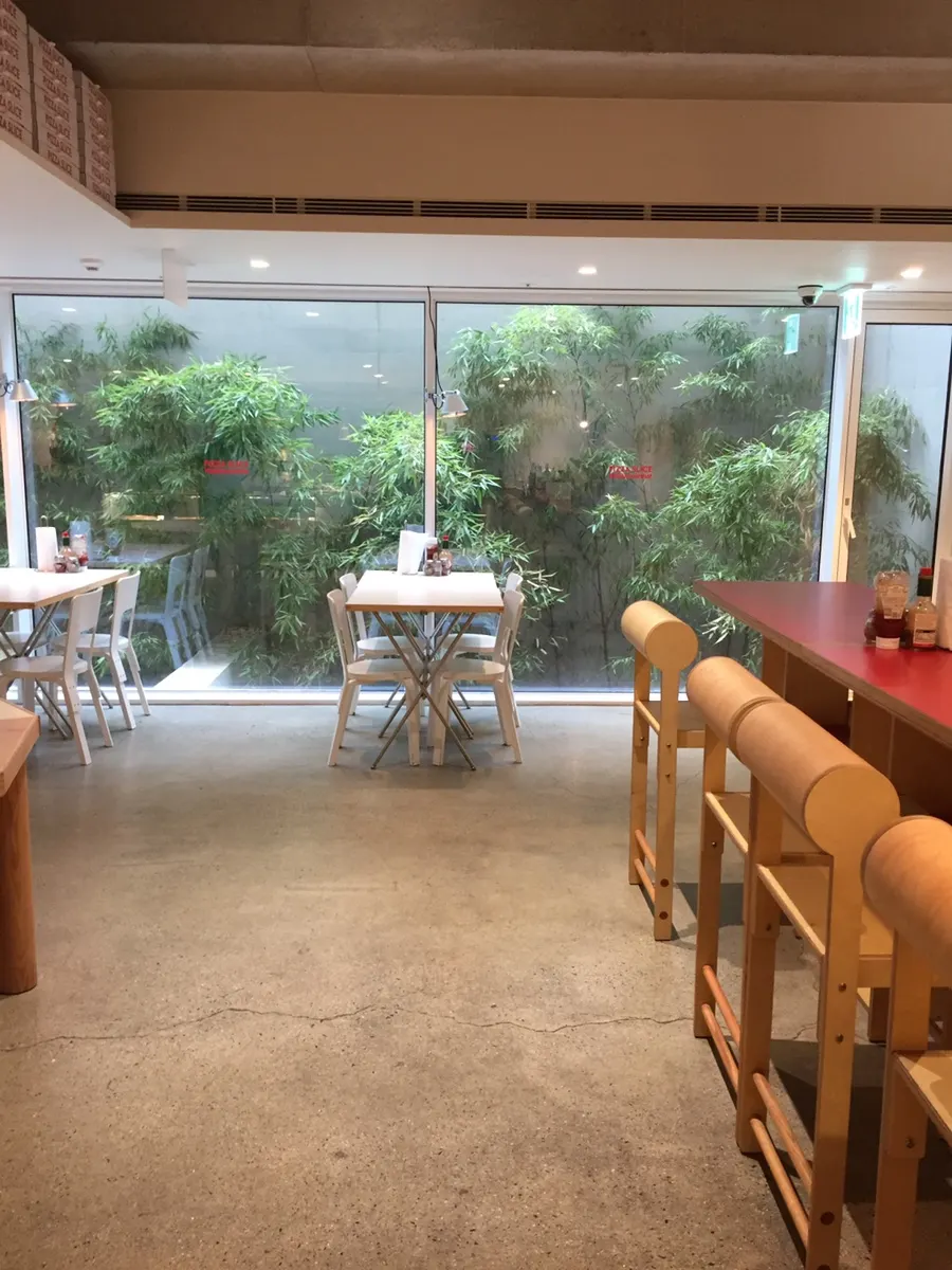 Large window at the basement-level restaurant