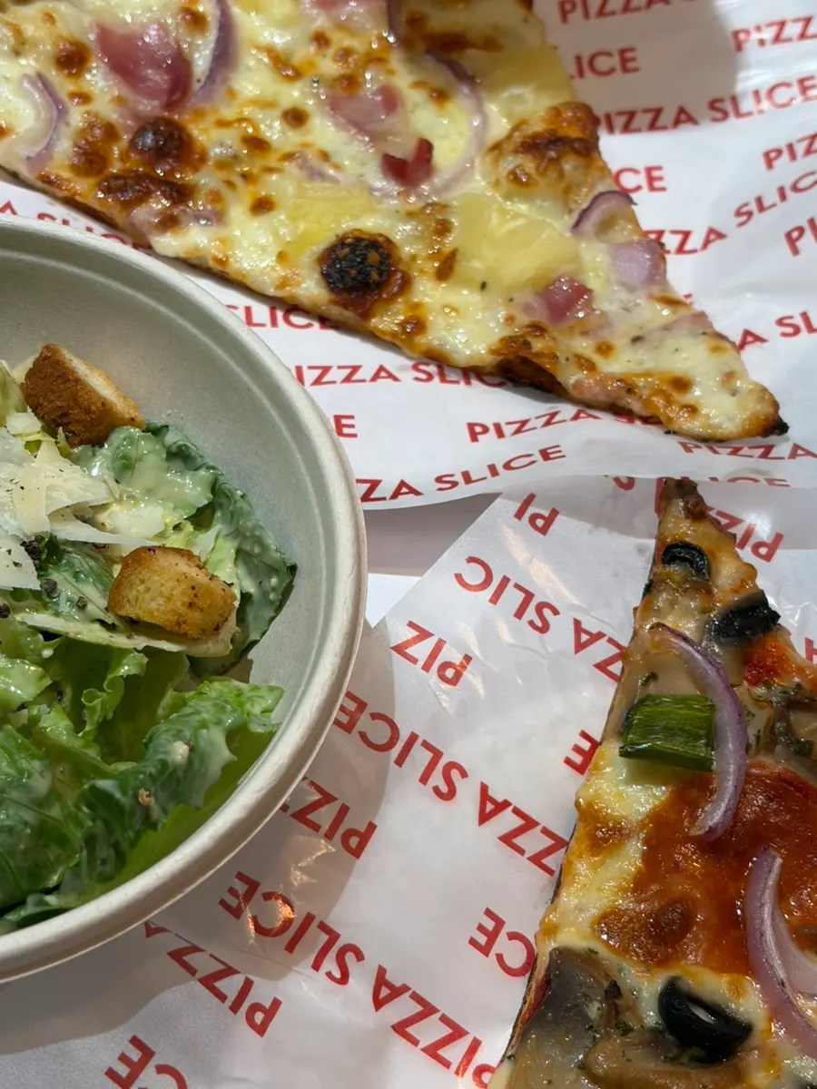 Today's pizza loaded with toppings and cheese