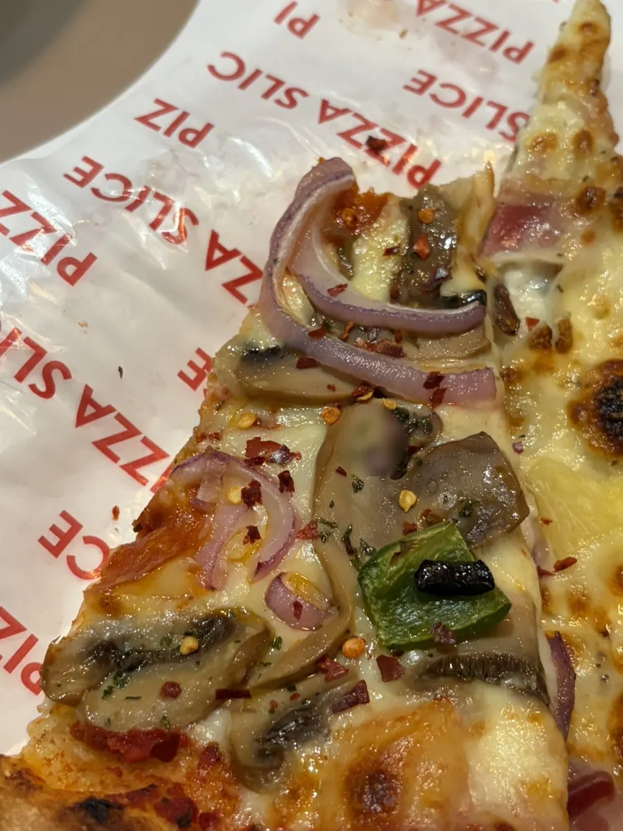 Hot sauce, oregano and pepper on the table
