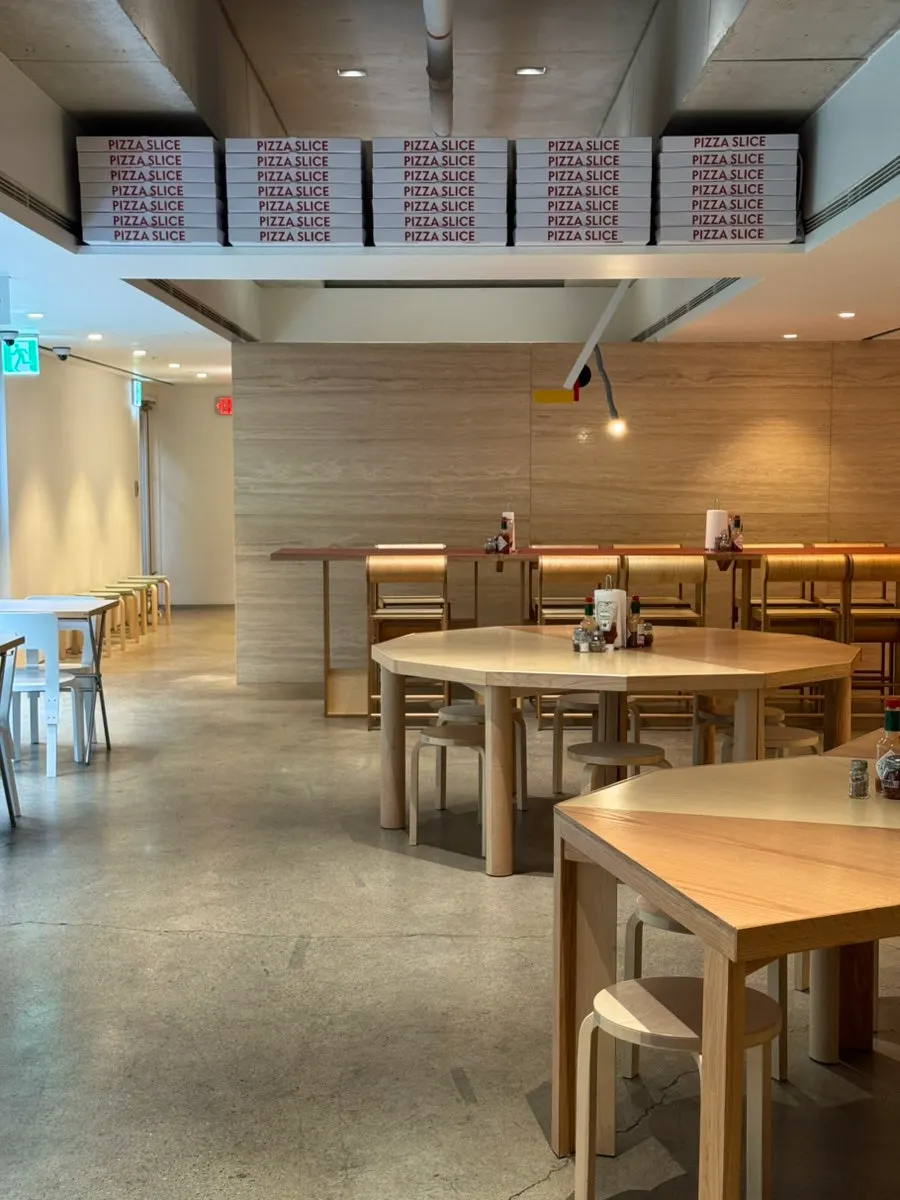Seating inside the shop with generous table spacing