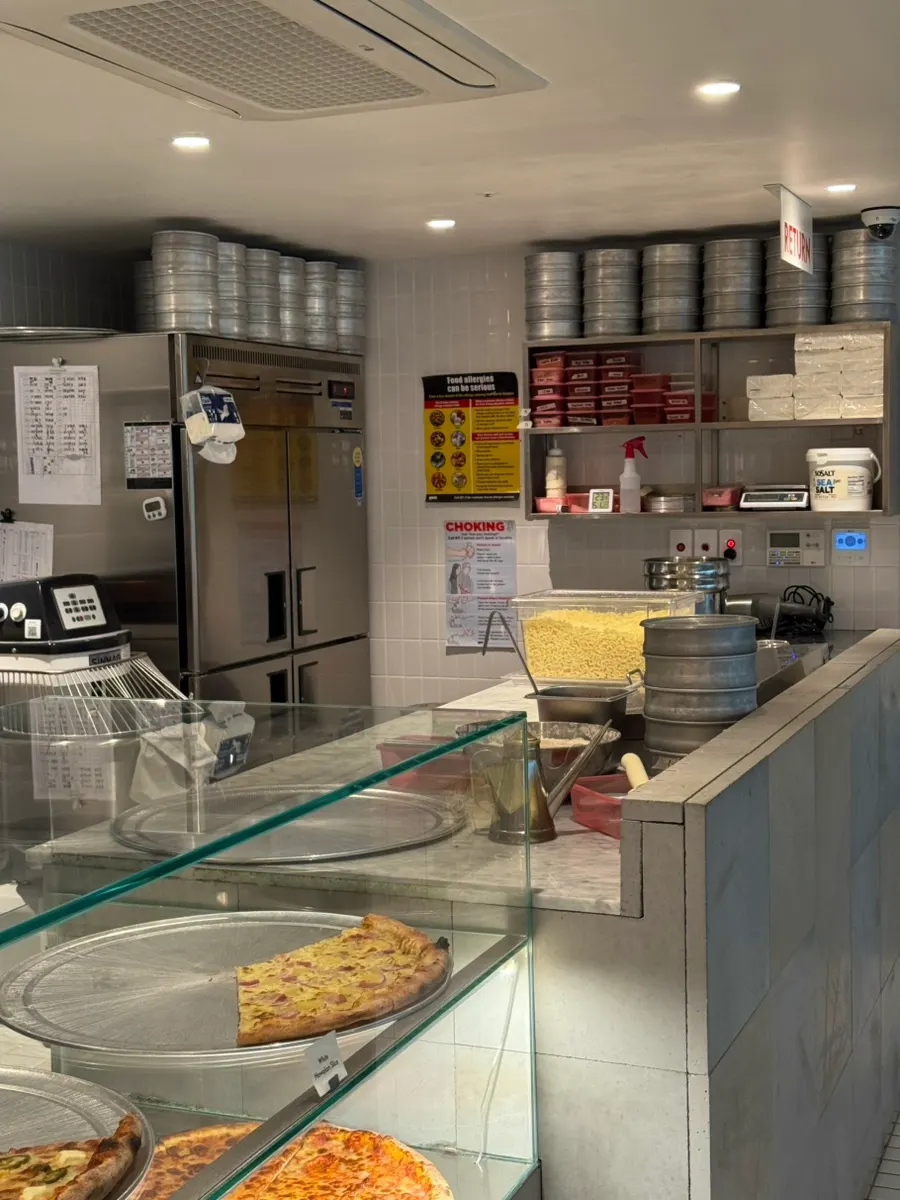 Open kitchen where pizza is made