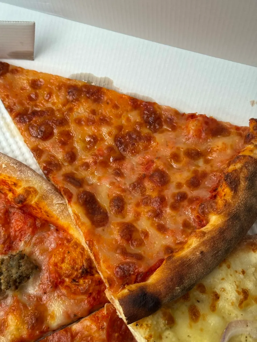 Cheese slice piled high with cheese