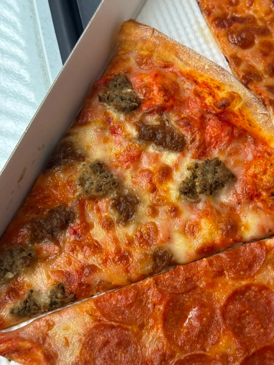 Meatball slice topped with large meatballs