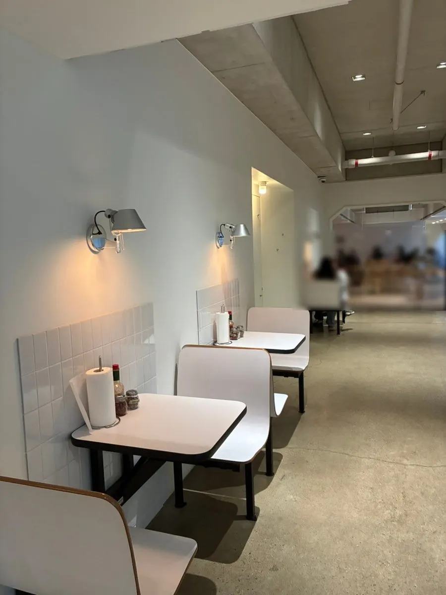 Full view of the basement pizza shop's dining hall