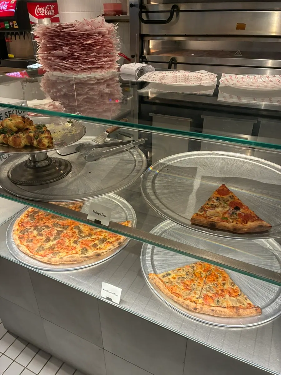 The order counter in front of the open kitchen