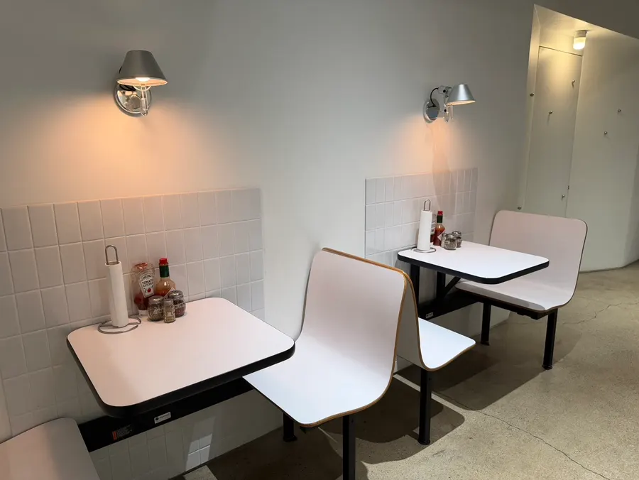 View of seating with lighting inside the shop