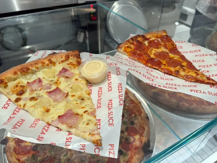 Order of pepperoni and white Hawaiian slices